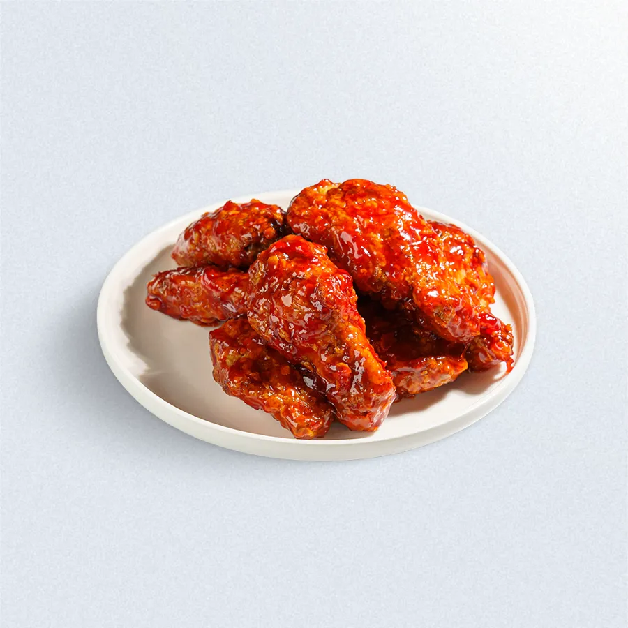 Куриные крылья в соусе Яннем